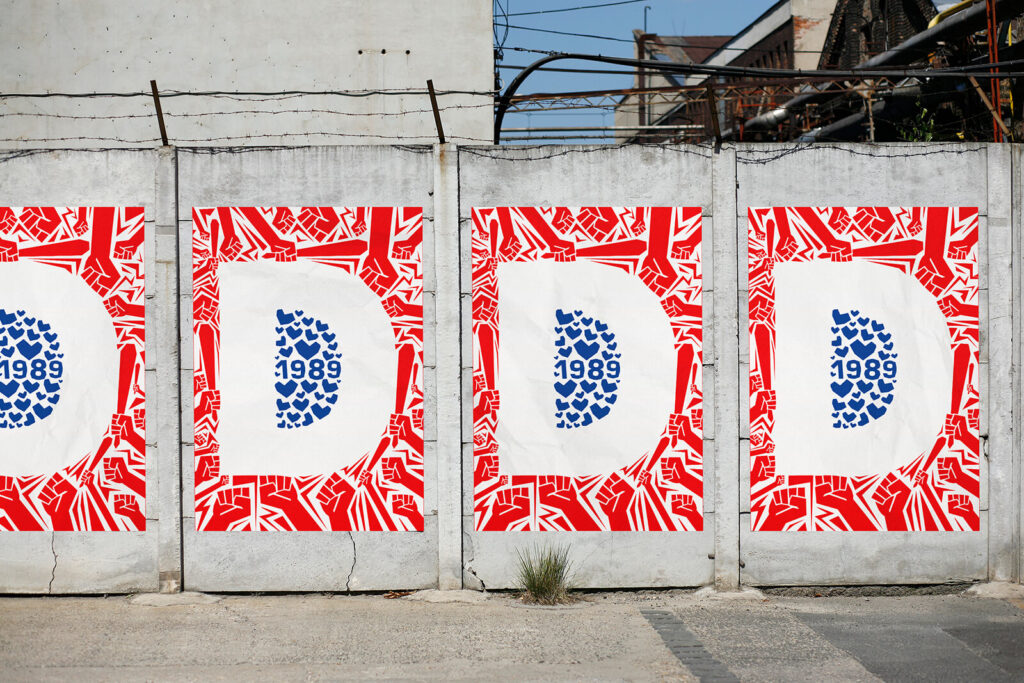 Poster series with a bold letter D on a wall